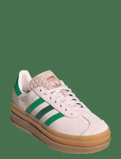 adidas Originals GAZELLE BOLD J - Låga sneakers ALMPNK/COUGRN/GOLDMT New